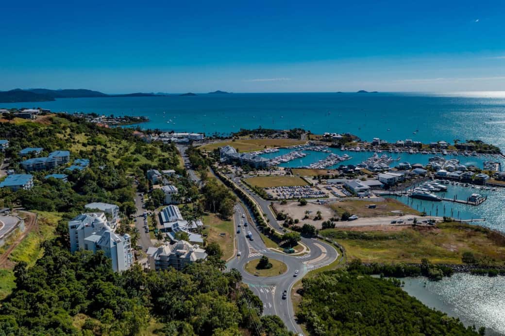 The Sebel in bottom left corner looking out to The Port of Airlie and sea views