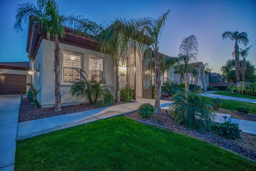The front door is easily accessible by both path and stairs. The front door is easily accessible by both path and stairs.