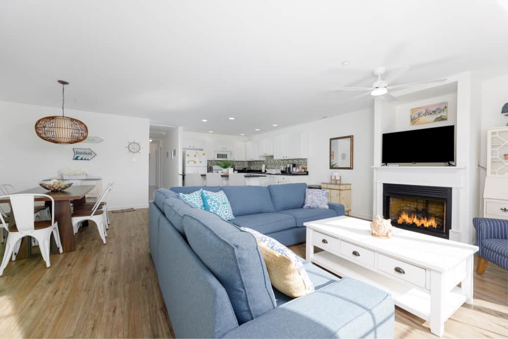 Welcome to your living room, with a fireplace for stay during the colder months!