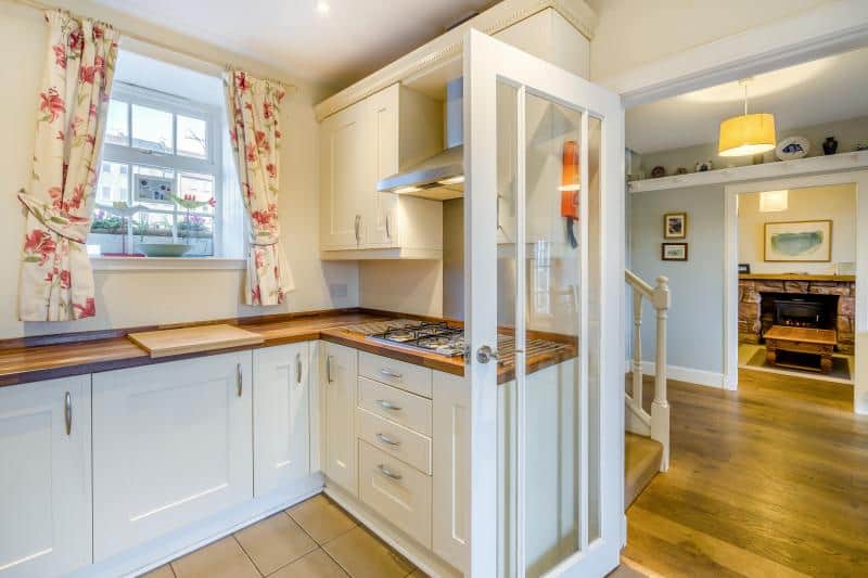 Kitchen through to dining hall and living room