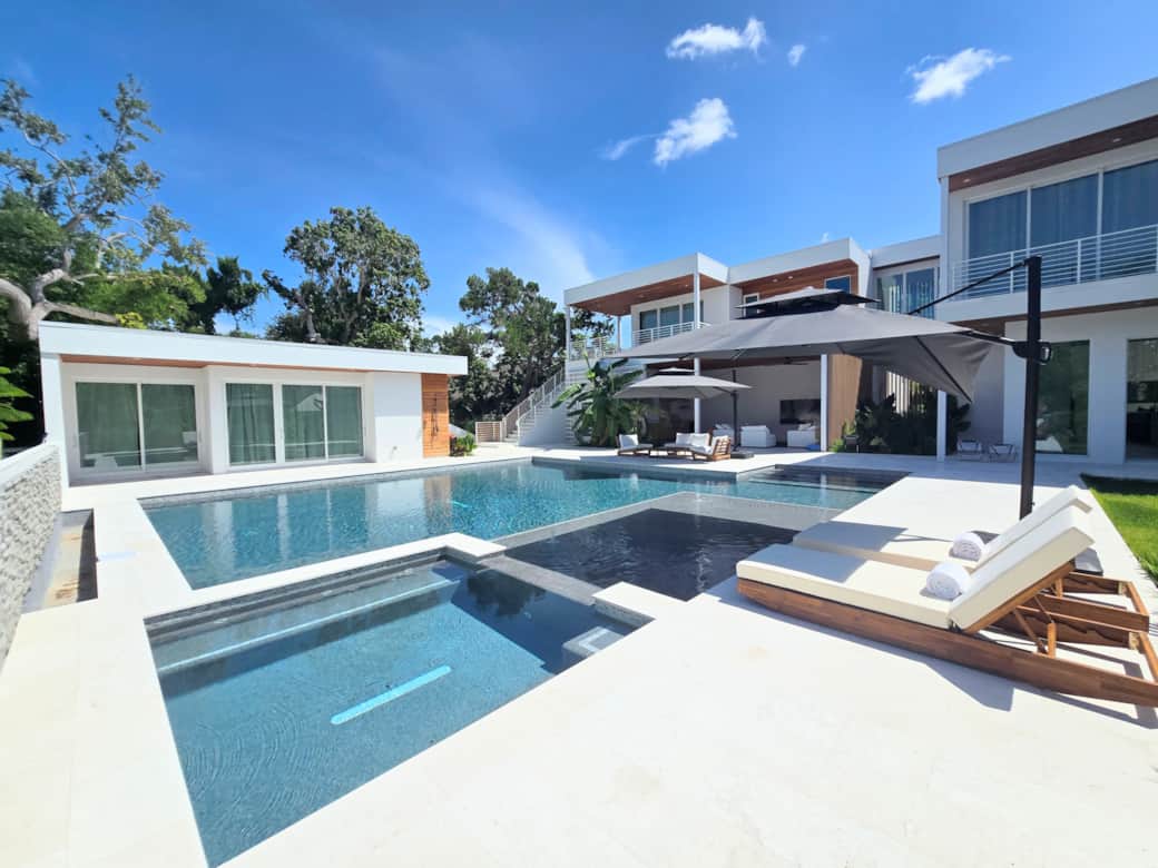 Siesta Key luxury vacation rental home view of the whole backyard  