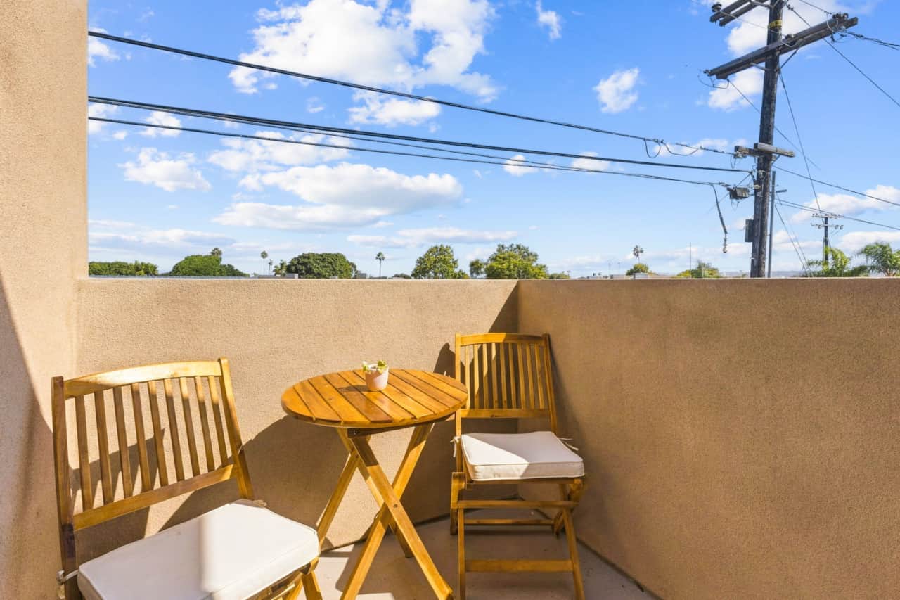 Private Balcony with Open Neighborhood Views