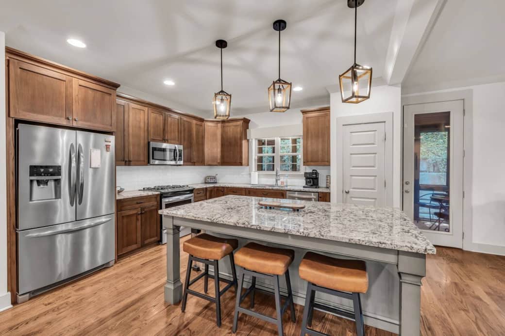 Plan on staying in for the night?  Grab some groceries at the Publix 5 minutes away and enjoy cooking in this well appointed spacious kitchen while conversing with friends and family in the connected living spaces.