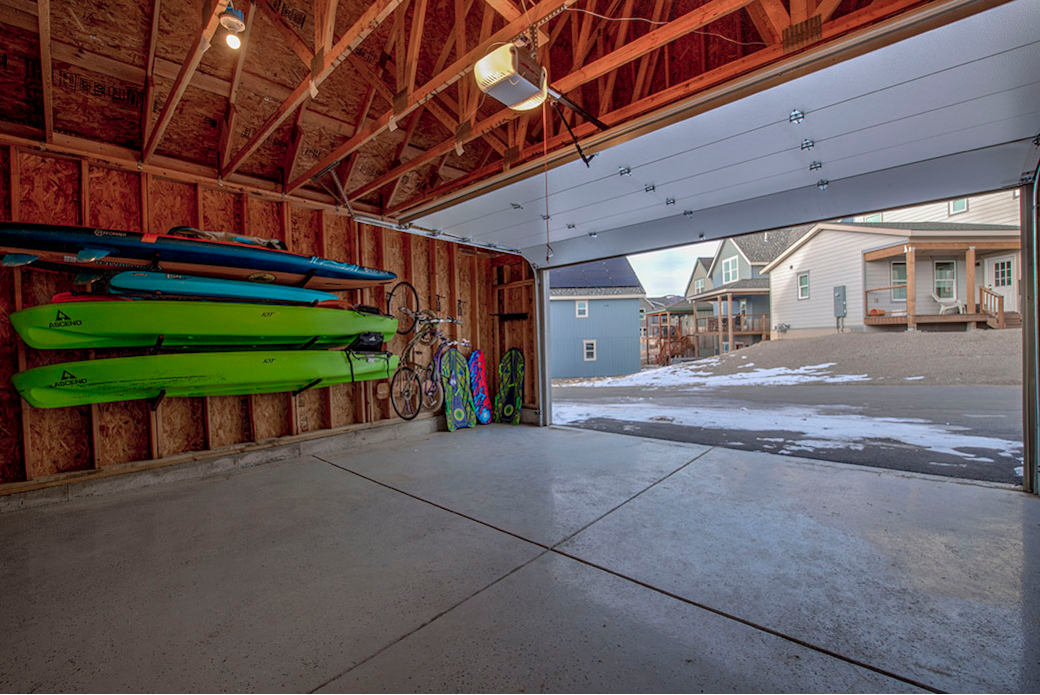 2 car garage with kayaks (3), paddle board (1), bike rack, ski rack 