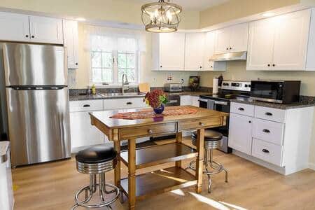 The kitchen includes full size appliances as well as many common smaller appliances and cookware.