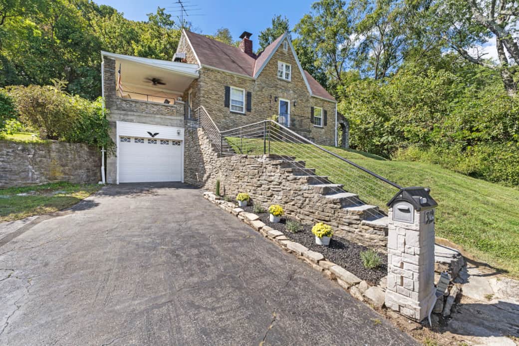 All stone house, front entrance steps. Guests can enter through garage or from porch front entry.