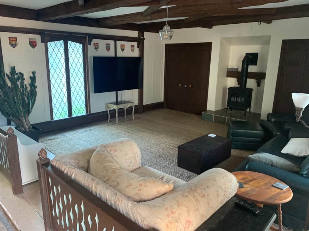 Enjoy a movie on the 70" TV in front of the propane fireplace. 
