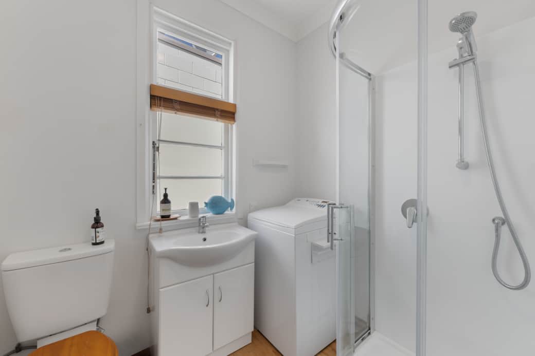 The private bathroom features premium complimentary toiletries and luxury cotton towels. 