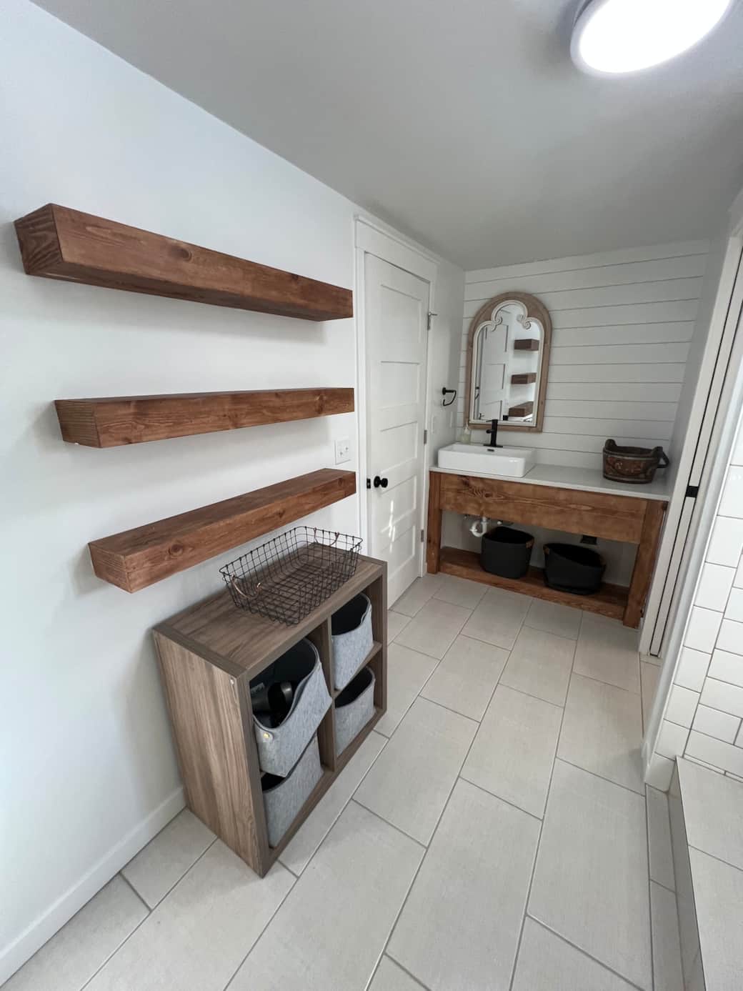 Loft bathroom with tub/shower combo, toilet with separate door.  Plenty of space for your toiletries or extras!