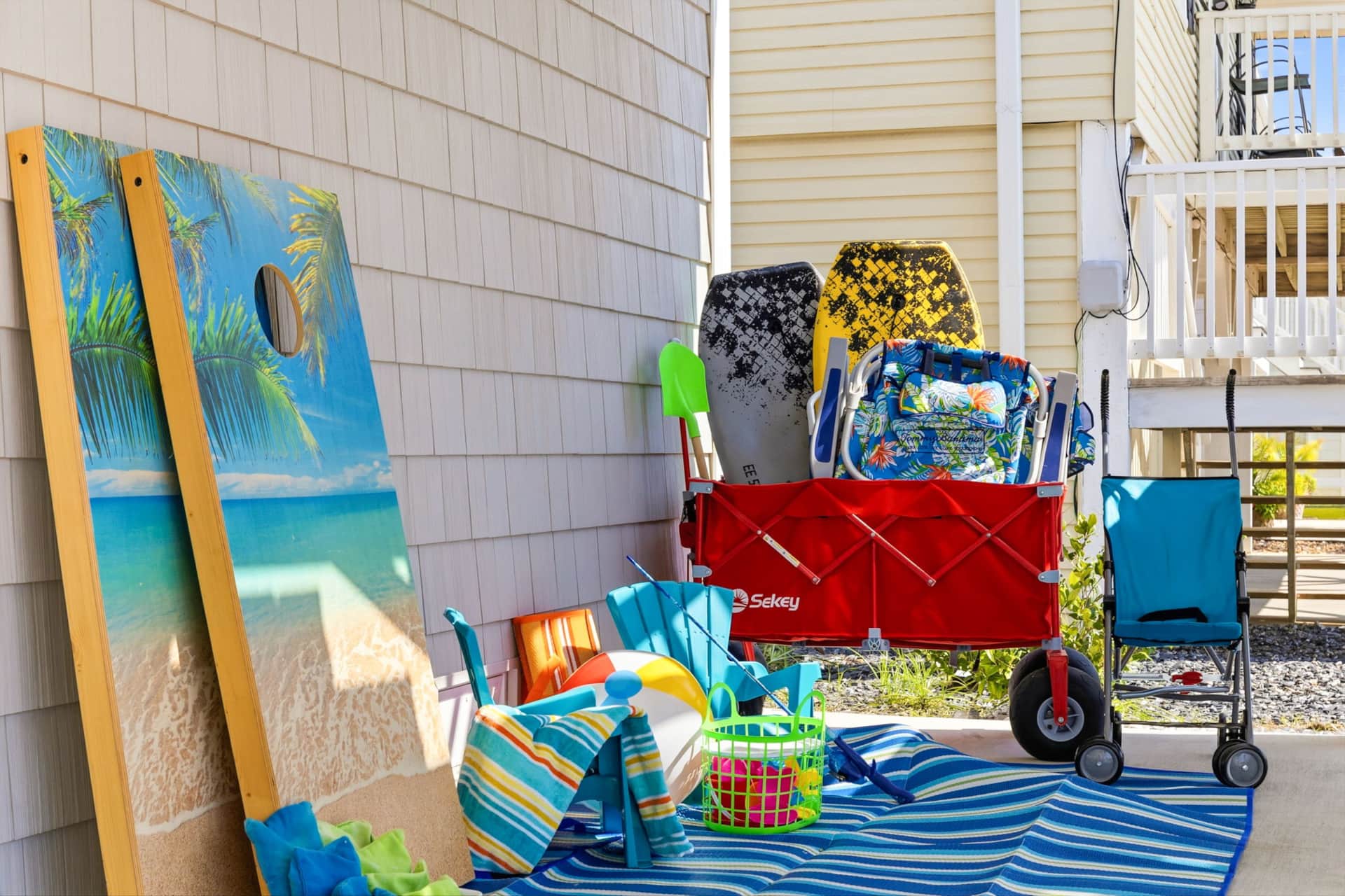 Beach wagon with chairs and boogie boards for guests