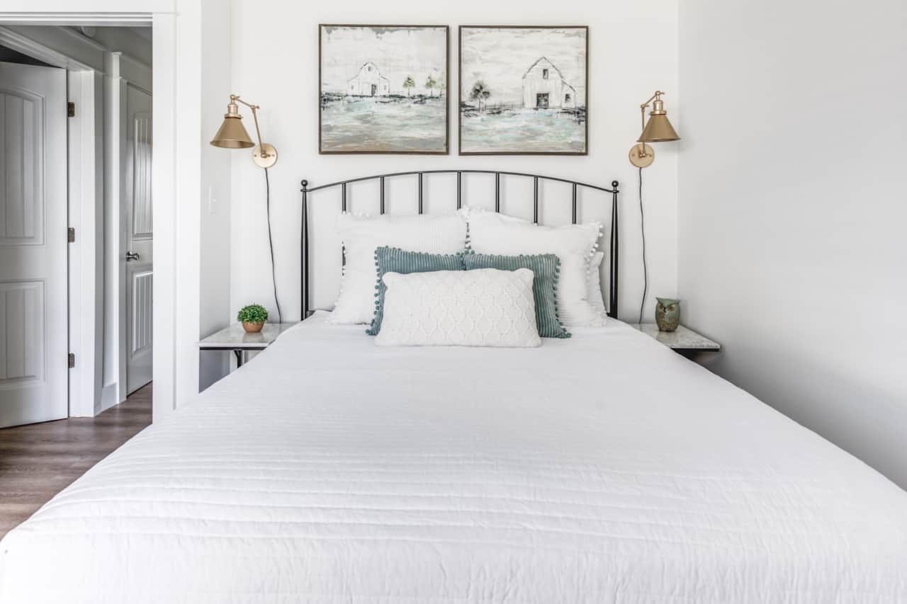 Adorable guest room with a queen bed. 