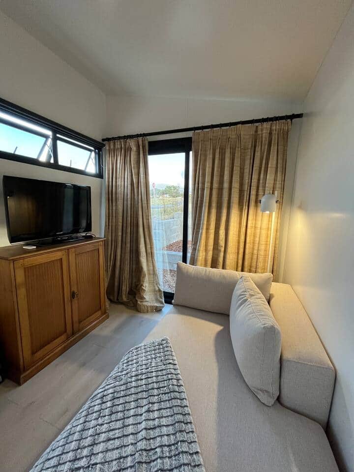 Lounge area in open plan living room / kitchen. 
