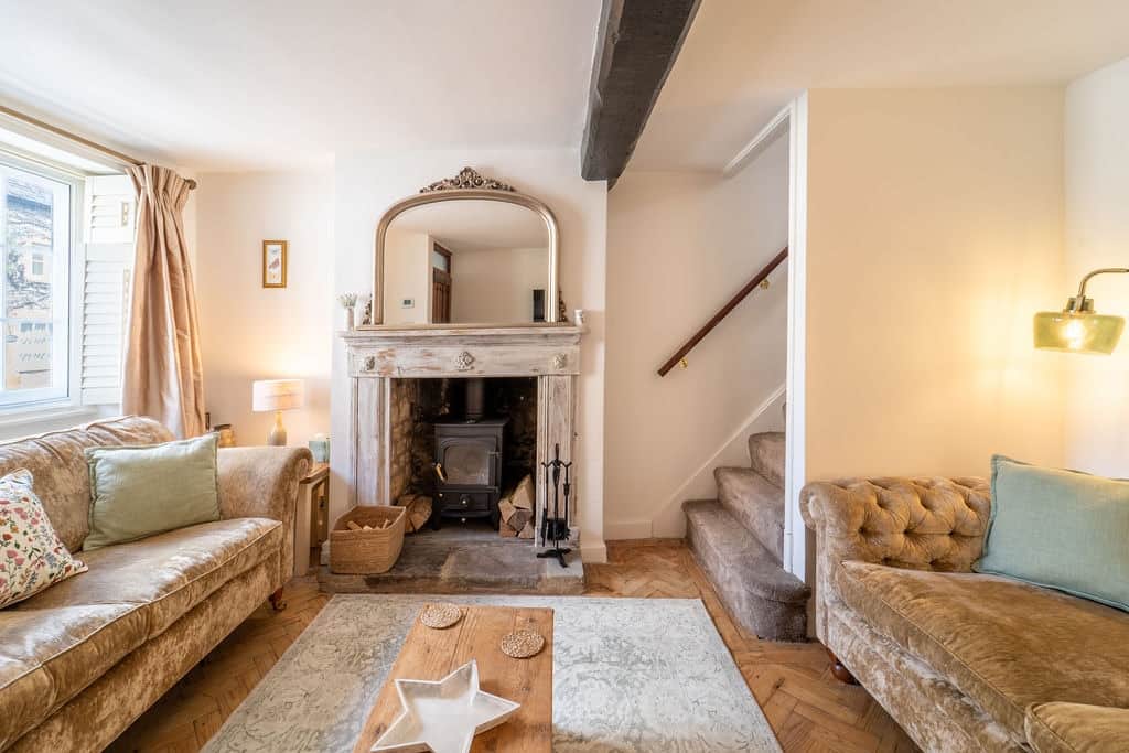 Cosy Cotswold living room with original fireplace