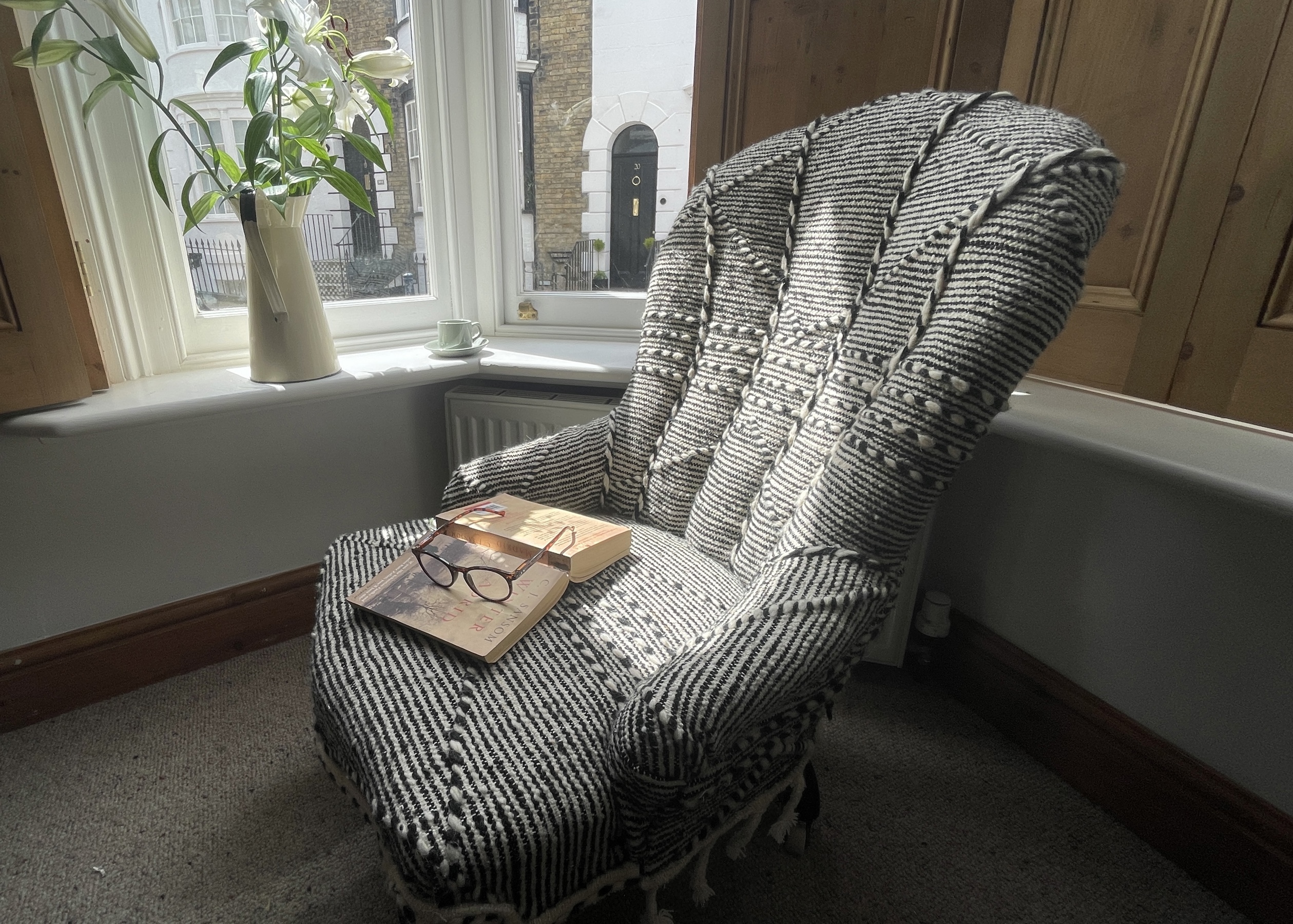 Victorian chair upholstered in Zanafi Rug with Book and Glasses