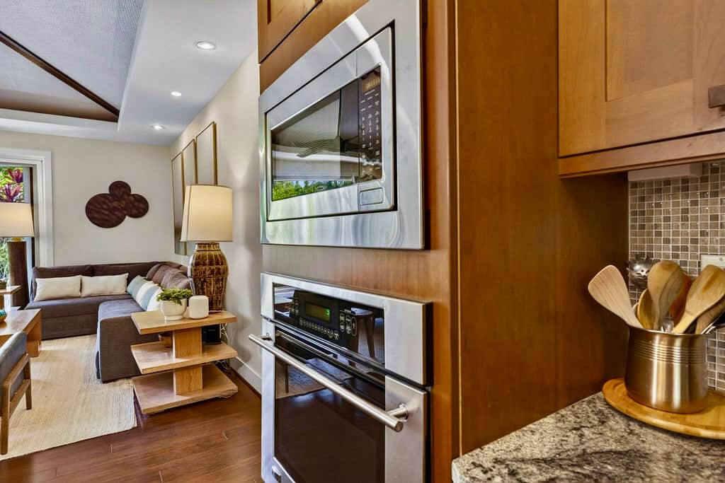 Kitchen, fully stocked, living room steps away for an open concept living vacation with family.