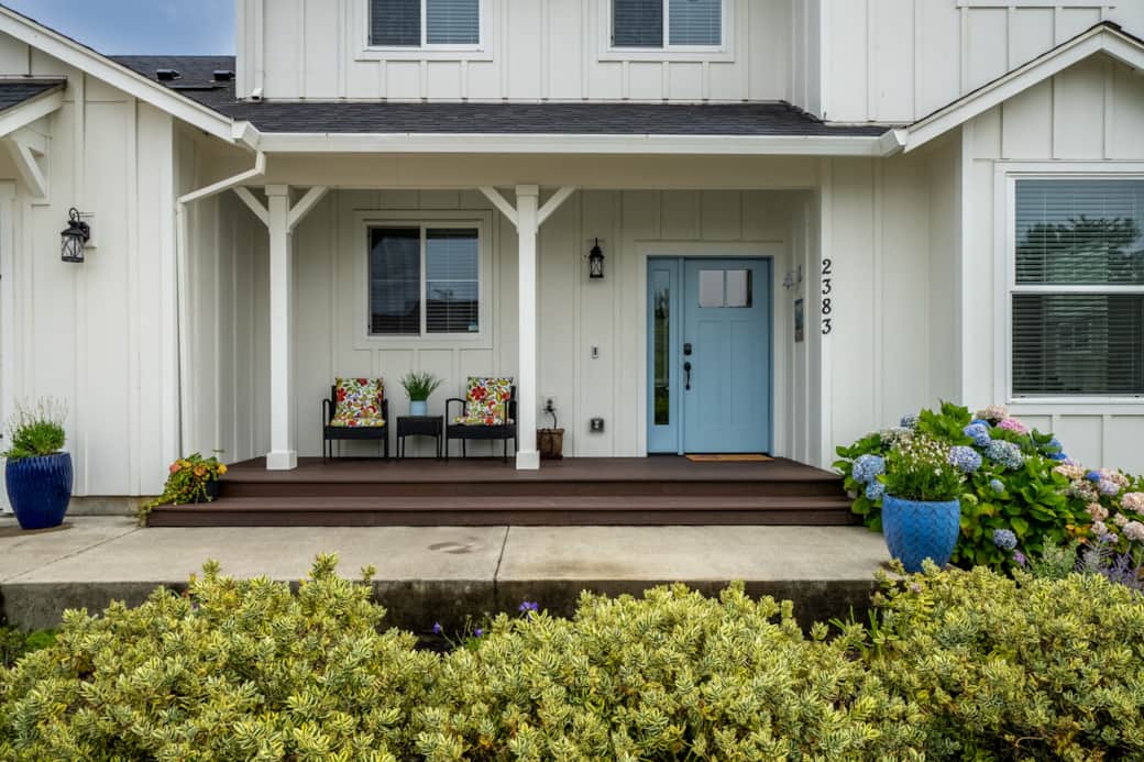 Step onto the front porch of this elegant home and feel your stress melt away.