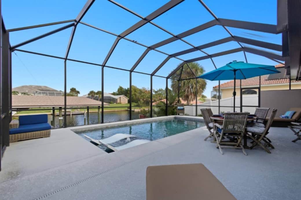 Rest poolside overlooking the saltwater canal