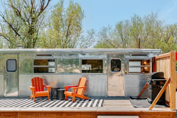 The 56 vintage Spartan trailer in a wetland setting Sheridan Wyoming
