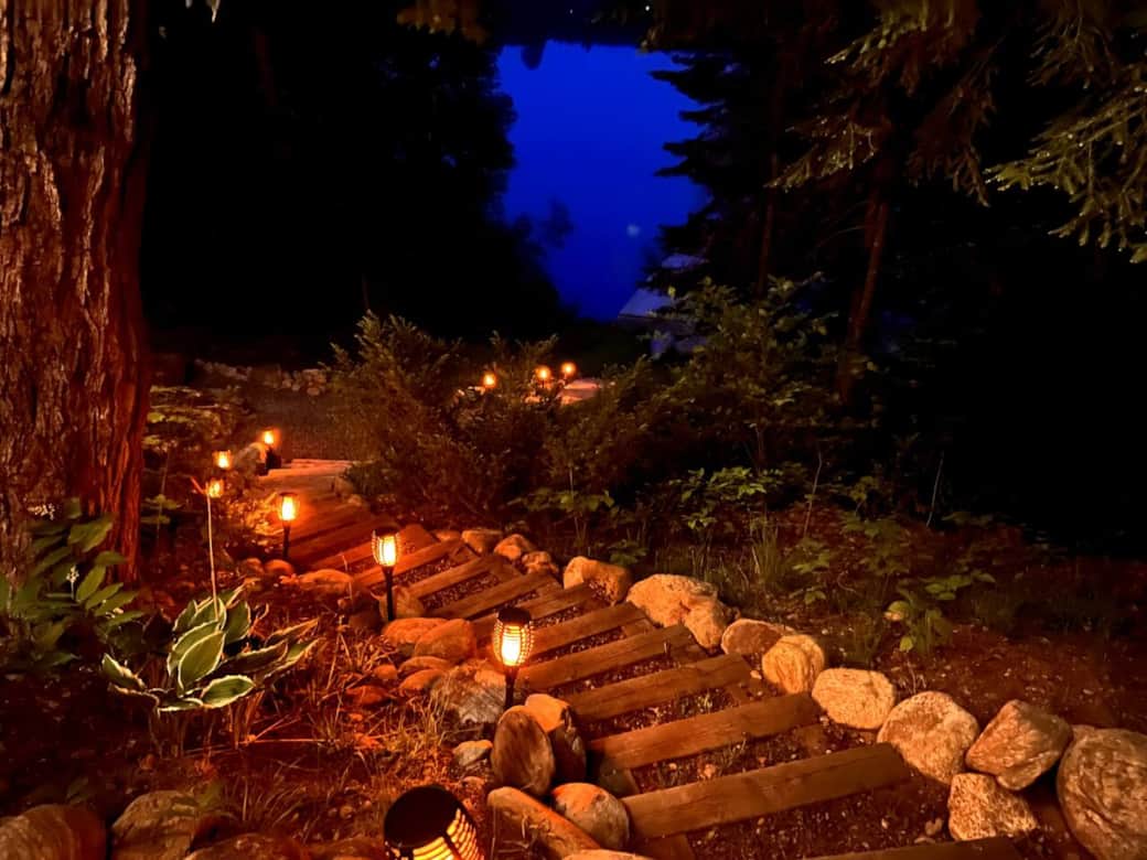 Steps down to the fire pit. 