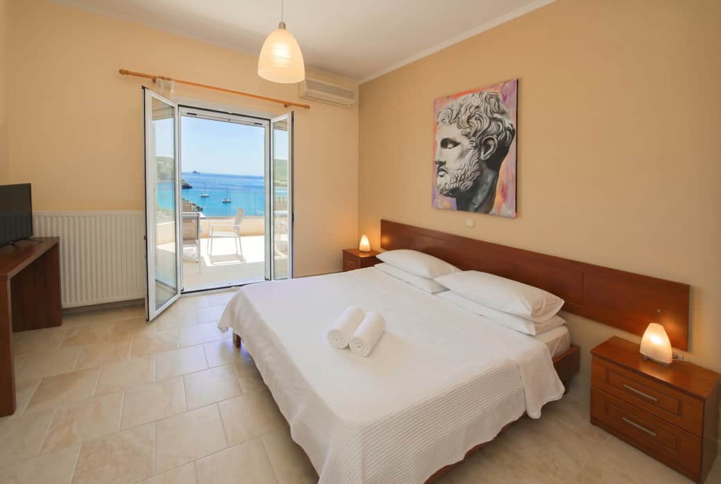 Platakia blu apartment 01 primary bedroom sea view Platakia blu apartment 01 primary bedroom sea view