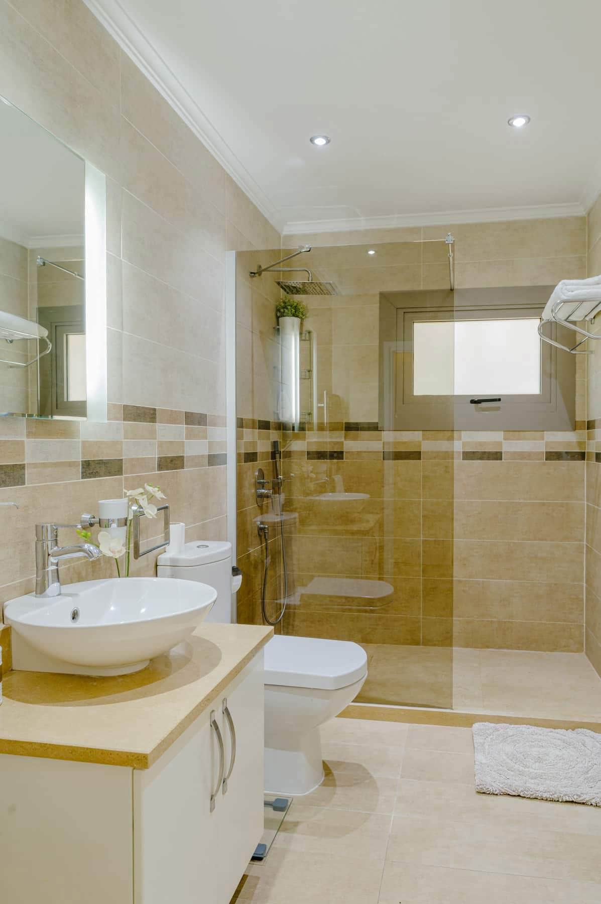 Fully fitted shower room, with built in bidet, leading off the ground floor bedroom area.