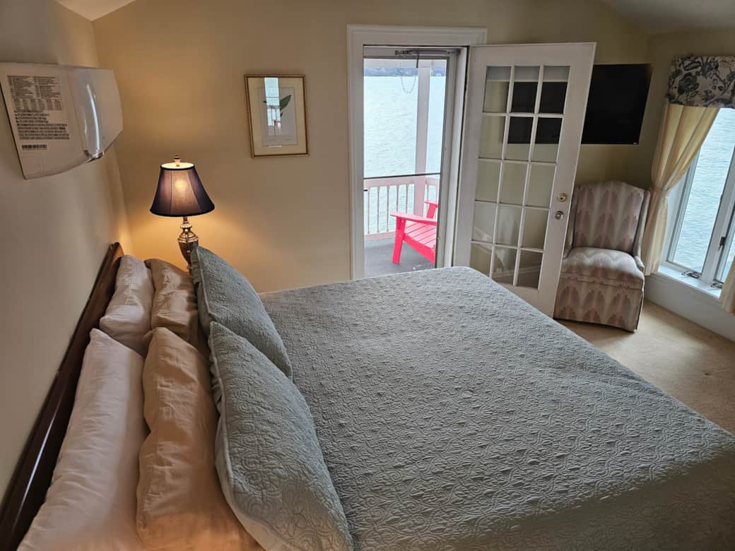 Upstairs king with balcony view