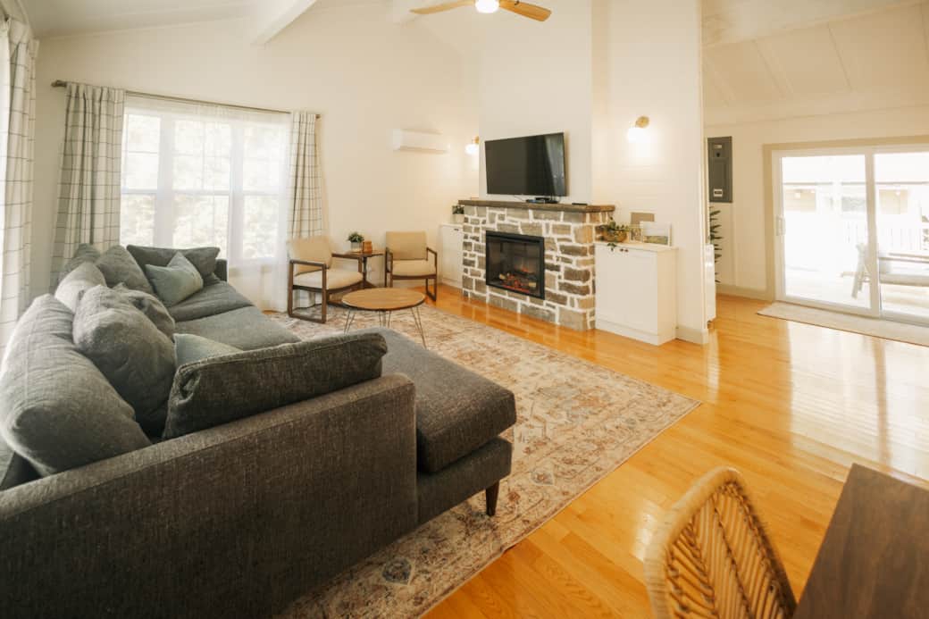 Living room with cathedral ceilings and ample seating Living room with cathedral ceilings and ample seating