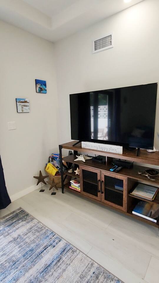 Living room TV, DVDs, Books, Games and a Nintendo Wii for rainy days in.