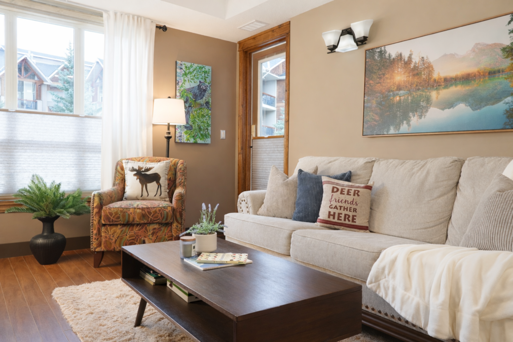 Modern living space with comfortable seating and a gas fireplace.