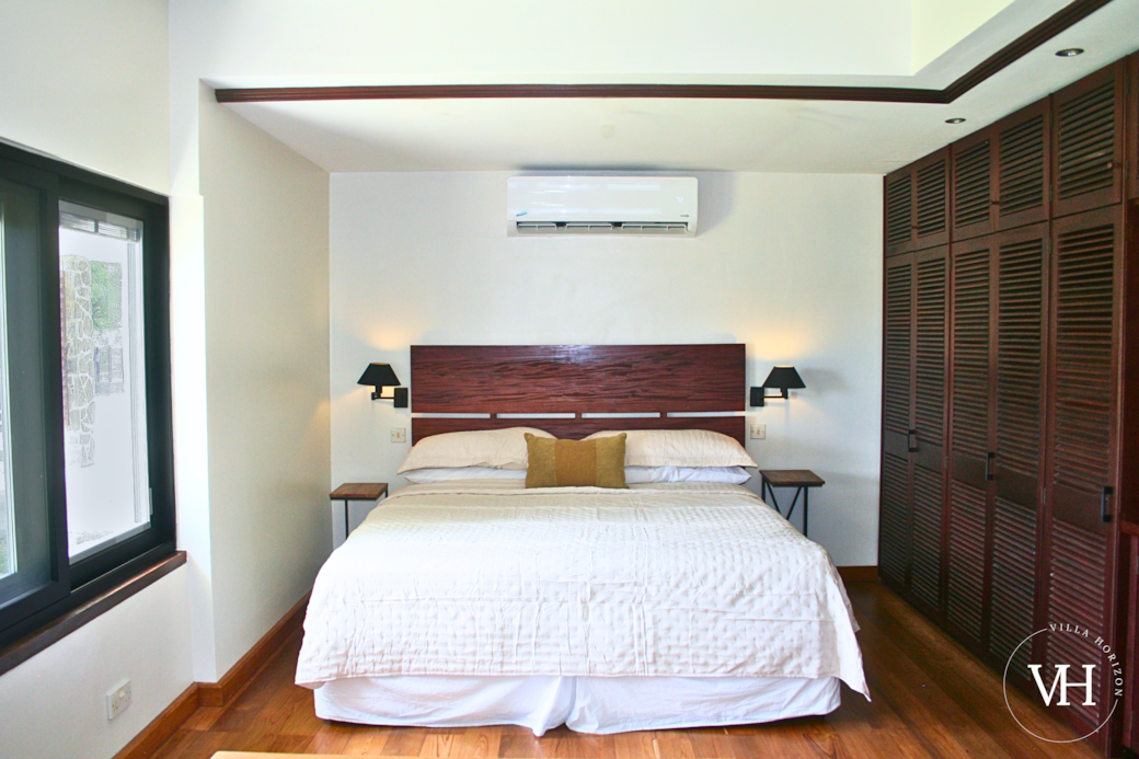 Bougainvillea Studio - Comfortable king bed and spacious closets. 