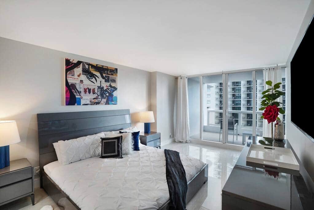 Master bedroom, king bed, Roku streaming tv, balcony access, vanity area, private master bathroom