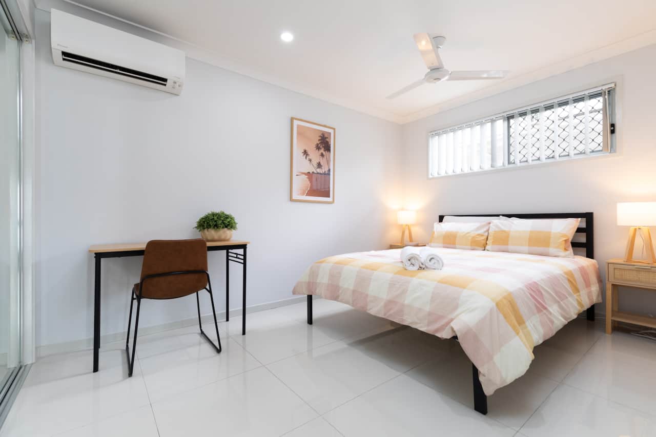 Bedroom: Peaceful bedroom with cozy design and ample storage 