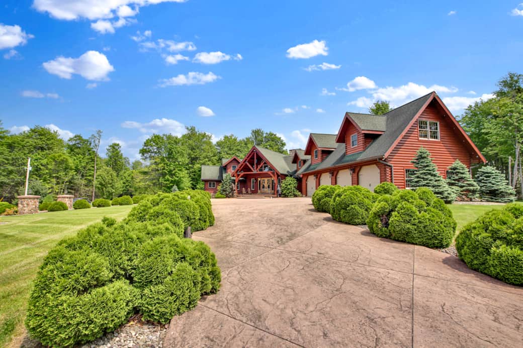 Paved Driveway, guests are welcome to use the first garage bay, next to the entry door. 