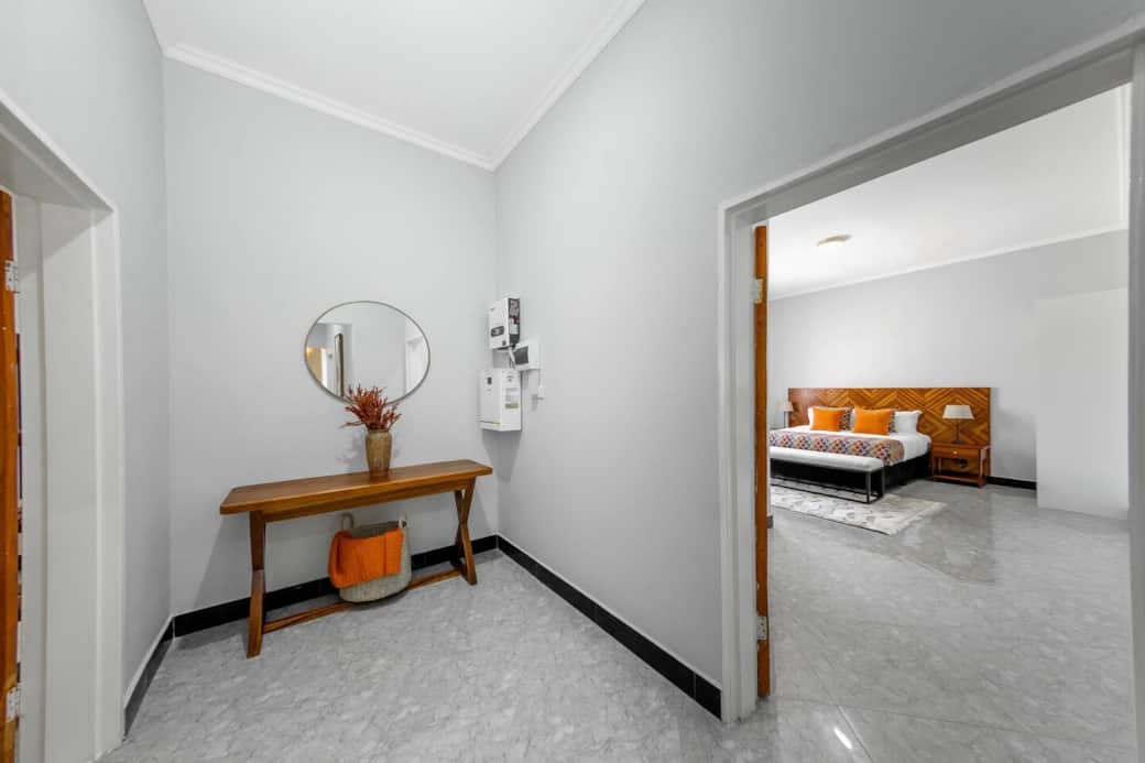 Entrance hallway leading to bedroom and living areas