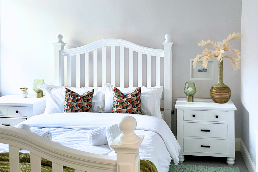 King size bed with memory foam mattress in spacious light room