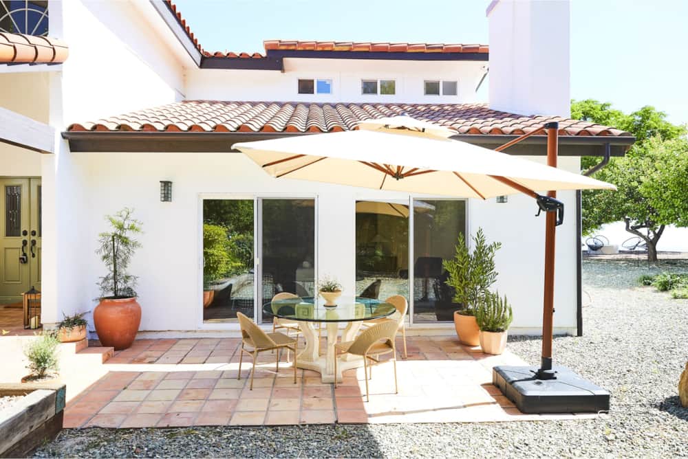 Shaded patio outside the house at The Ridge