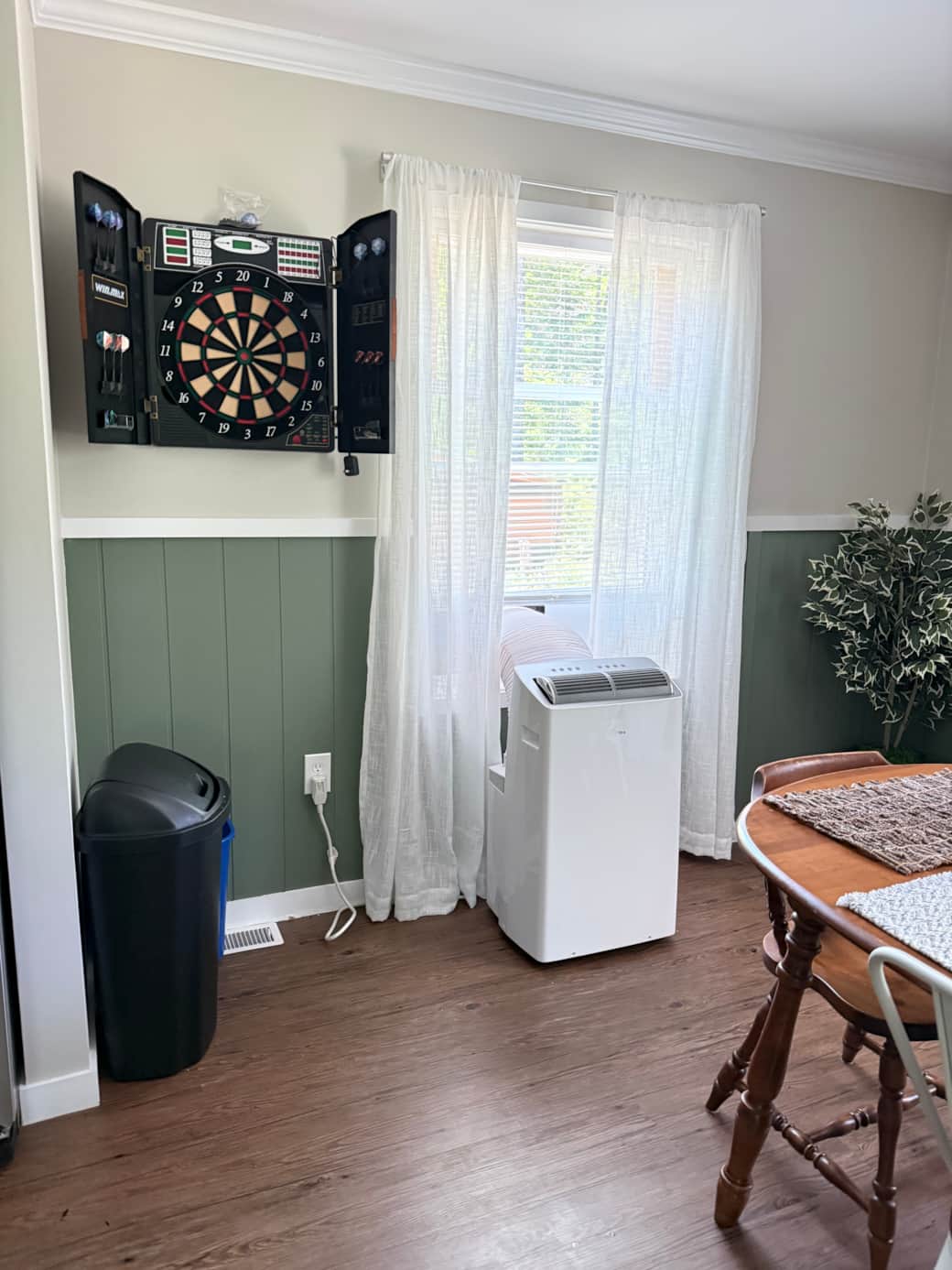 AC and Dart Board