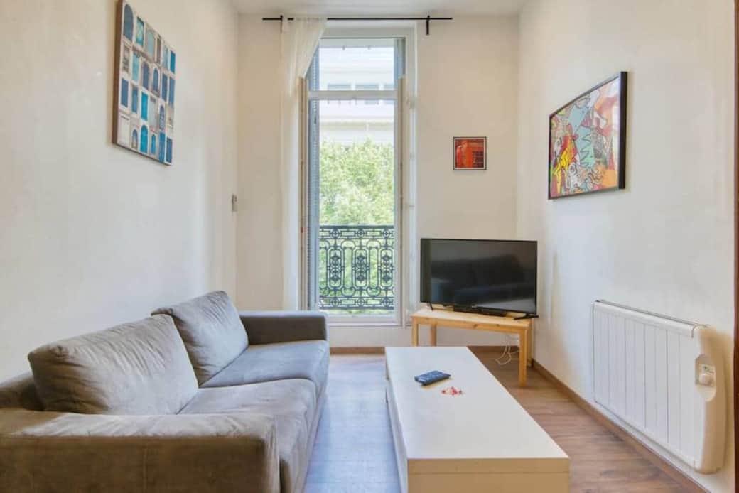 Séjour avec petit balcon