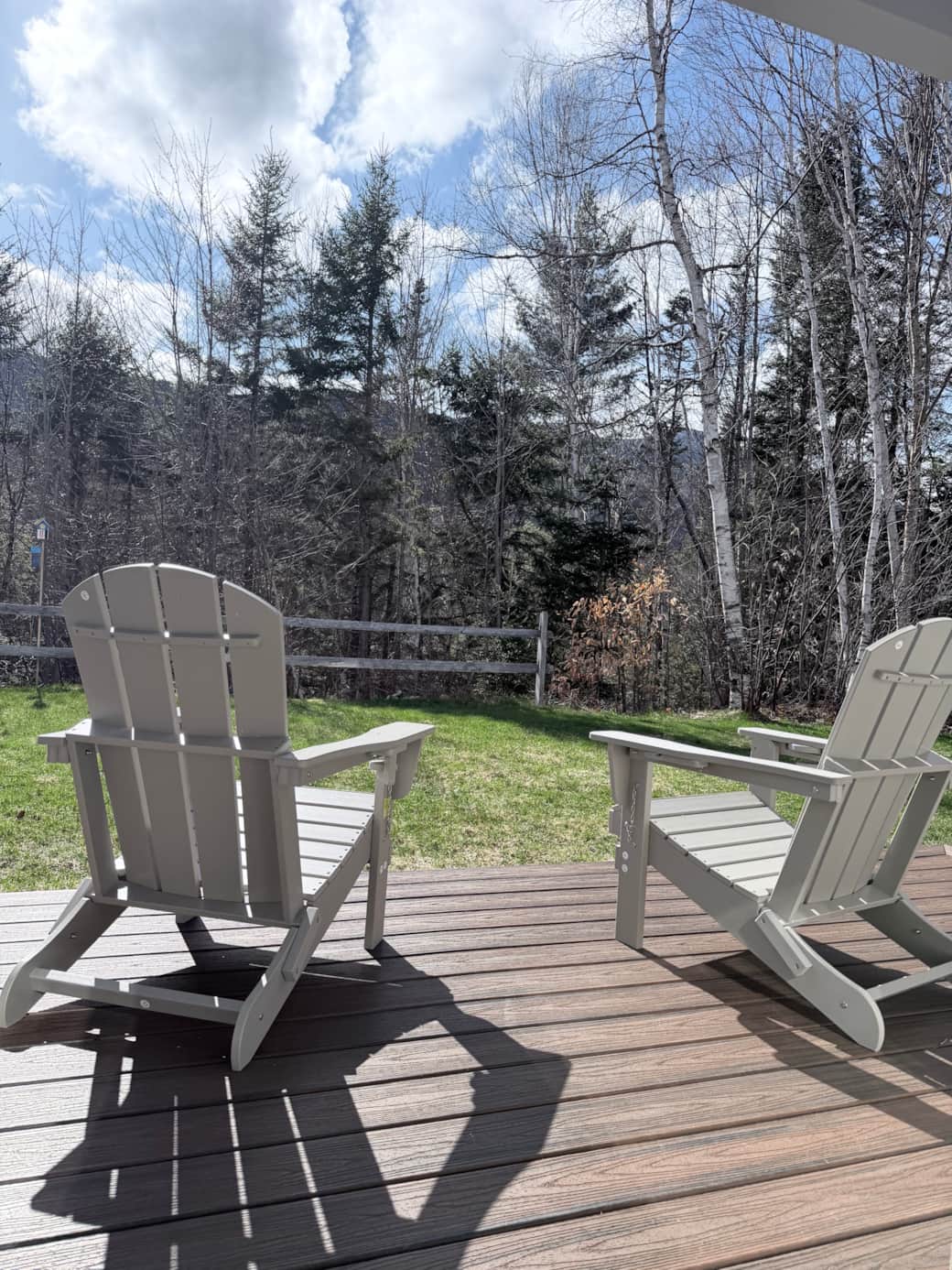 Adirondack chairs on the deck overlooking the river