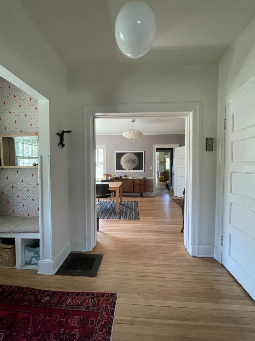 Entrance from foyer looking towards dining room and kitchen.