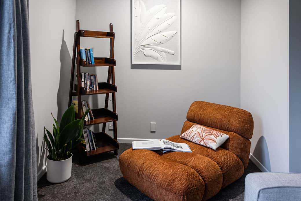 Reading snug in the TV room ... that orange lounger is the place to be for total relaxation!