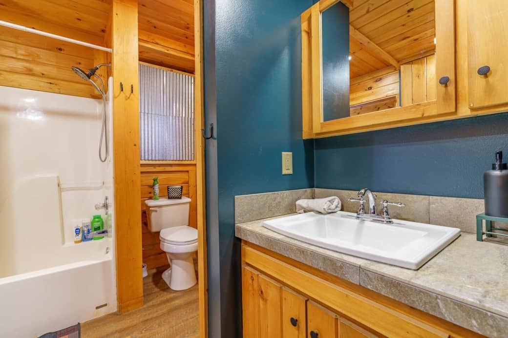 Bathroom has been equipped and stocked with soaps and shampoo. Cabinets filled with extra towels, toilet paper and laundry detergent.