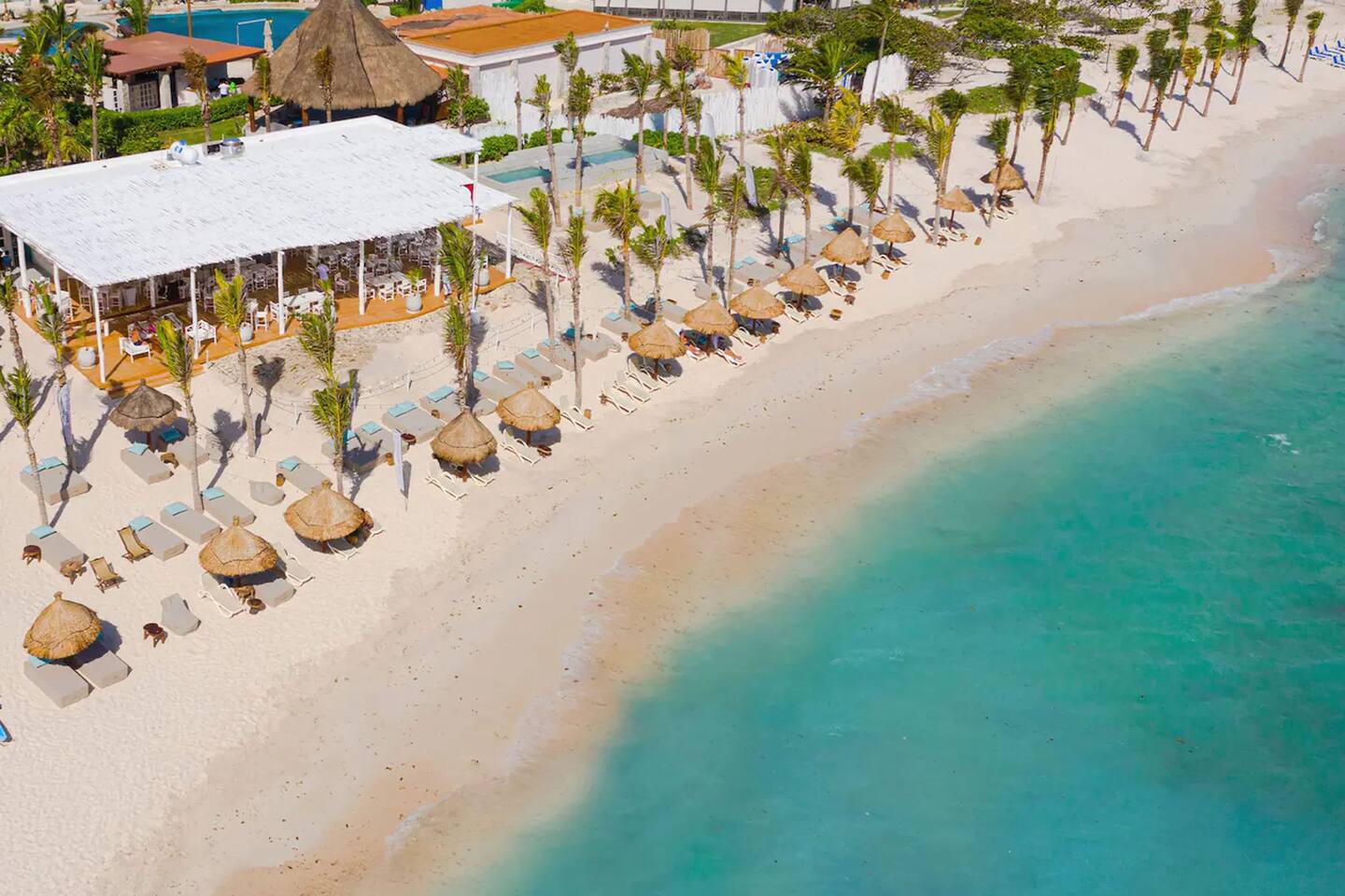 Experience oceanfront luxury at Kay Beach Club Akumal, just a short distance from the property. Relax on pristine sands, enjoy great food with ocean views, and unwind by the turquoise waters. $100 USD minimum consumption per family.