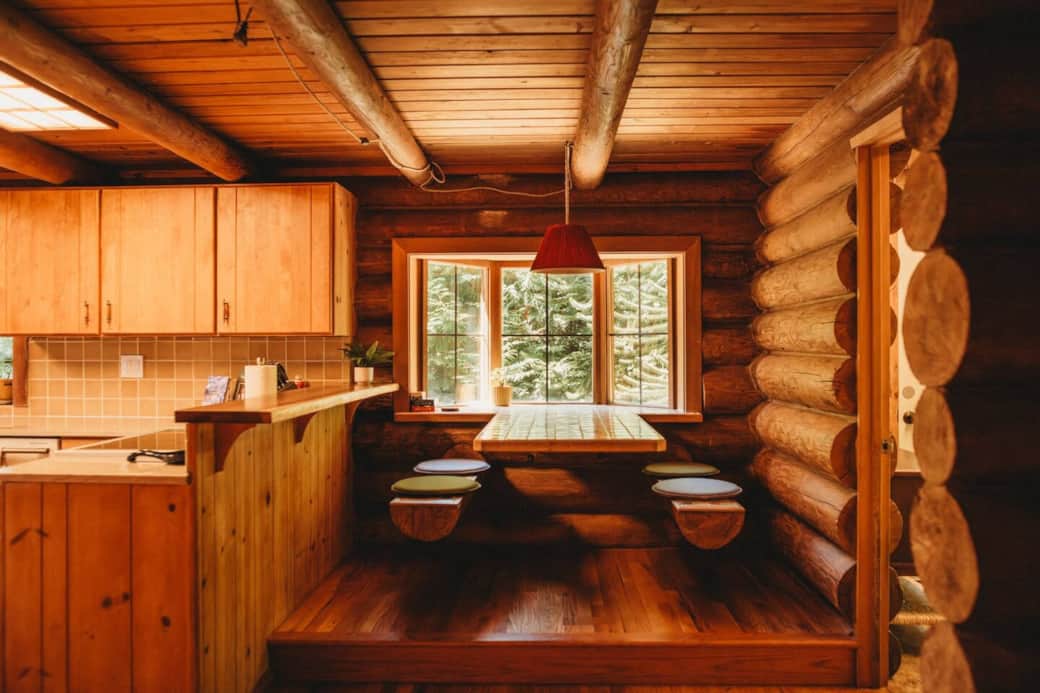 This built-in log eating nook seats 4 and will quickly become your favorite! Playing cards like UNO and Phase 10 sit on the windowsill for a convenient round of cards. This built-in log eating nook seats 4 and will quickly become your favorite! Playing cards like UNO and Phase 10 sit on the windowsill for a convenient round of cards.