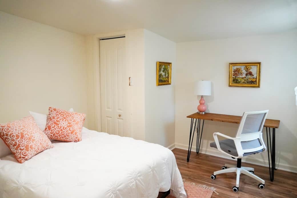 Guest Room 2 features a full size bed and a personal desk Guest Room 2 features a full size bed and a personal desk