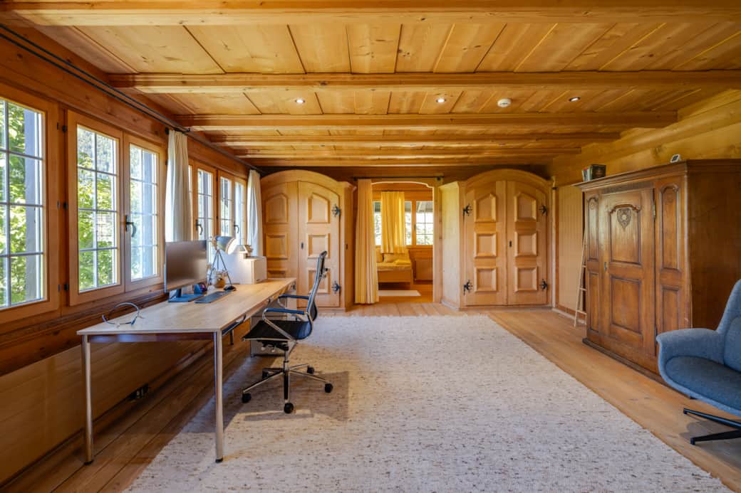 Spacious home office, featuring large monitor, printer, and high-speed internet (LAN & WLAN)