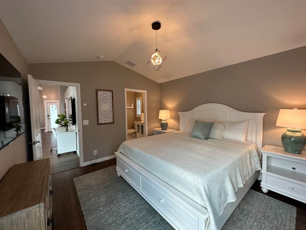 Master Bedroom with new Serta iComfort King Bed, Dyson HEPA Filter Fan, 55" Roku Smart TV, Voice Remote with headphone port, Dimmable Lighting, USB Charging port, Closet, Luggage Rack, Smoke/CO2 Detector.