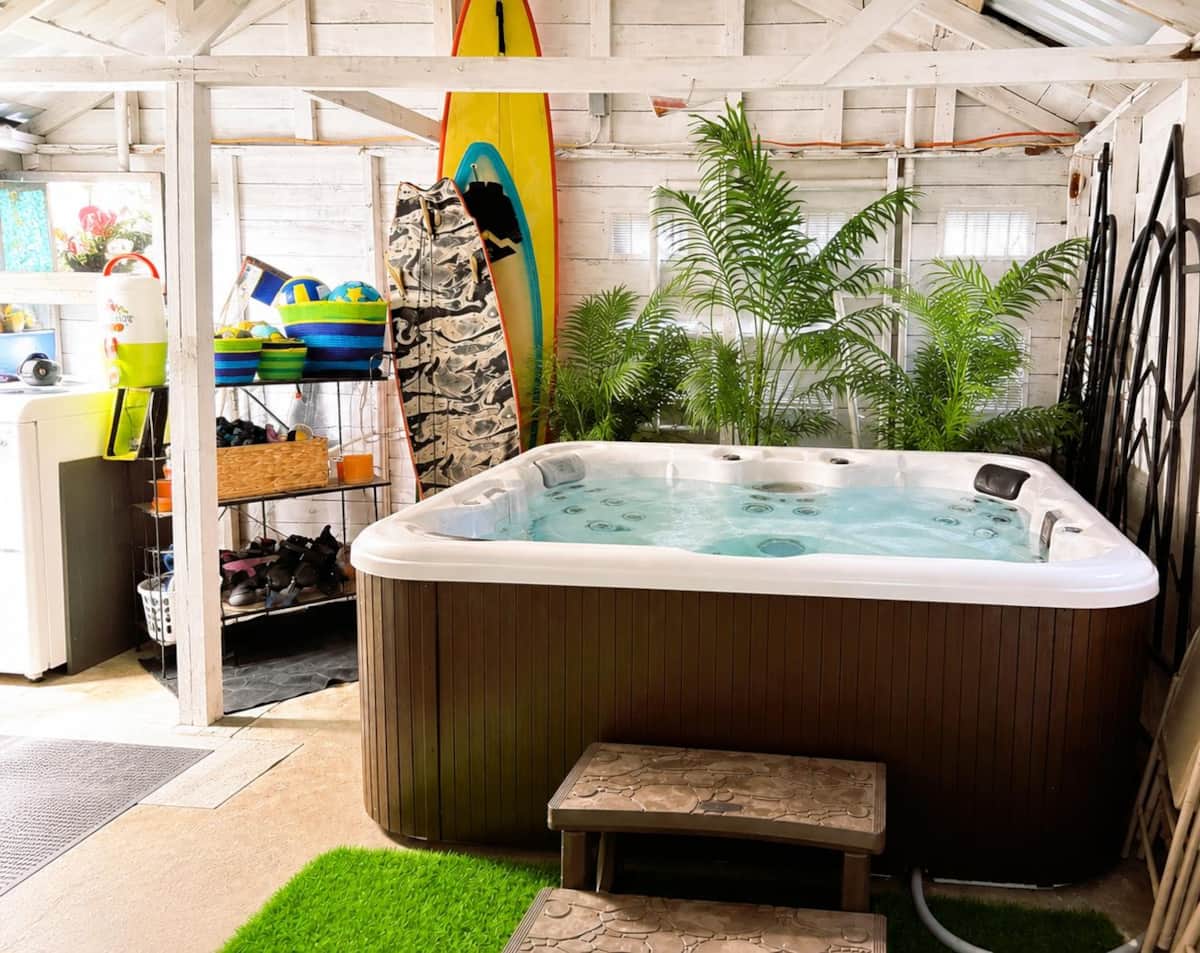 Indoor hot tub at White Magnolia Galveston vacation rental