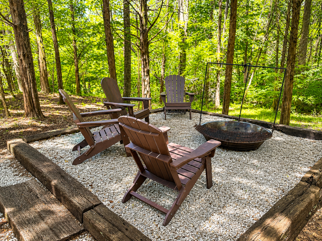 Aderondack chairs around the fire pit at Fish Upon A Star