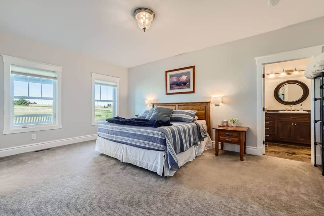 Main Level~Spacious Primary Bedroom with Luxe Ensuite Bathroom